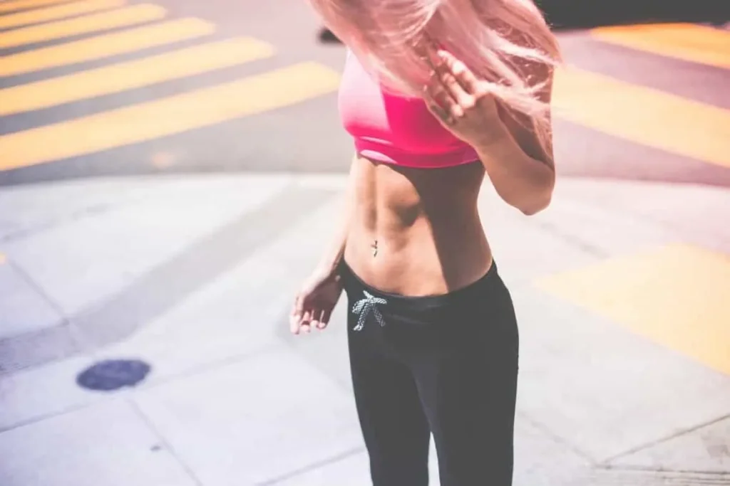 Woman with toned stomach after LA-EMS Body Sculpting Treatment Bellshill